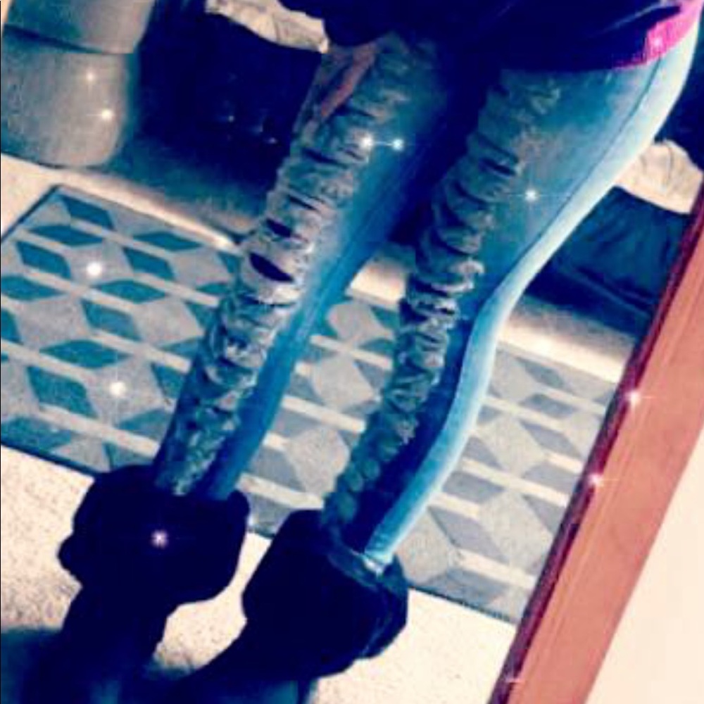 Distressed jeans.